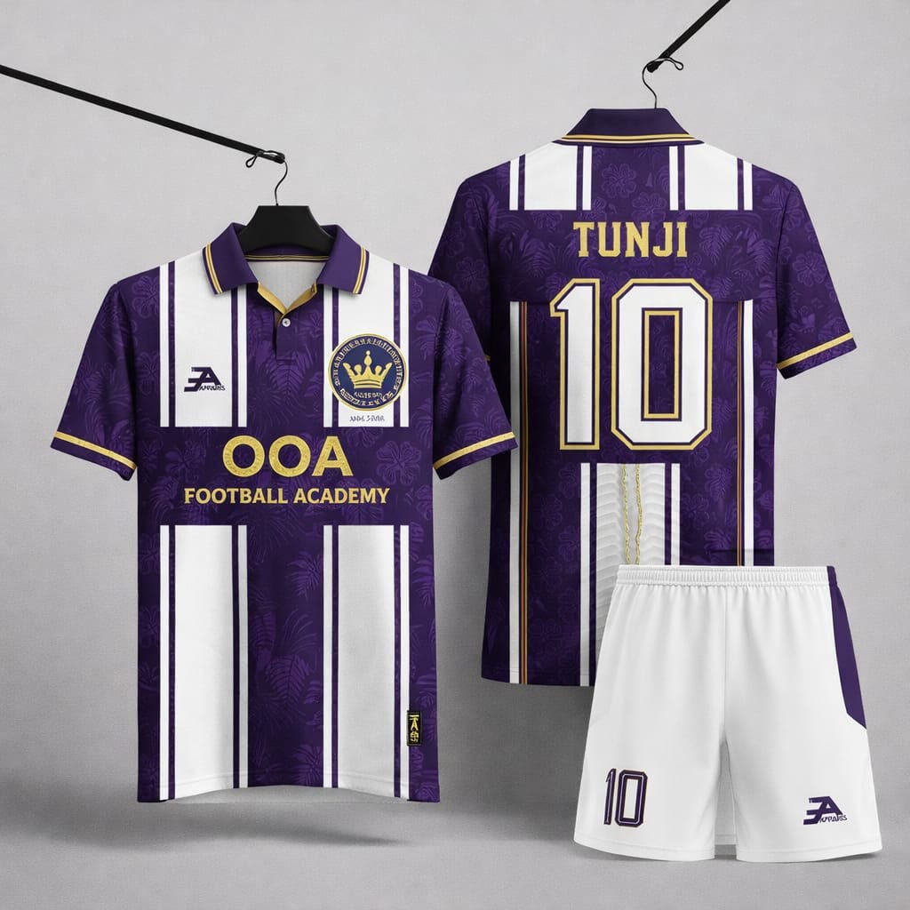 OOA Football Academy away kit — deep purple and white striped shirt with gold trim and white shorts